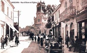 748- Mascara - Rue d'Oran et l'Eglise